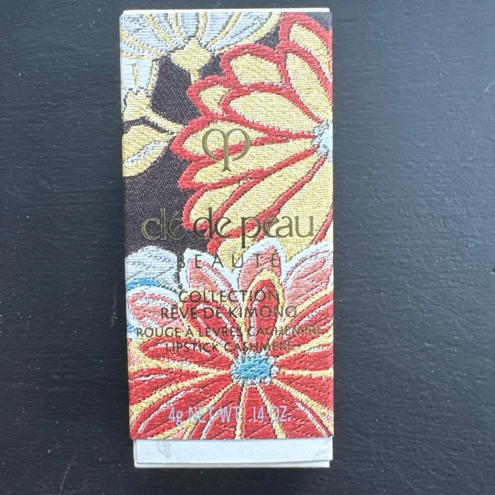 Vibrant Red Satin Lipstick in Elegant Packaging